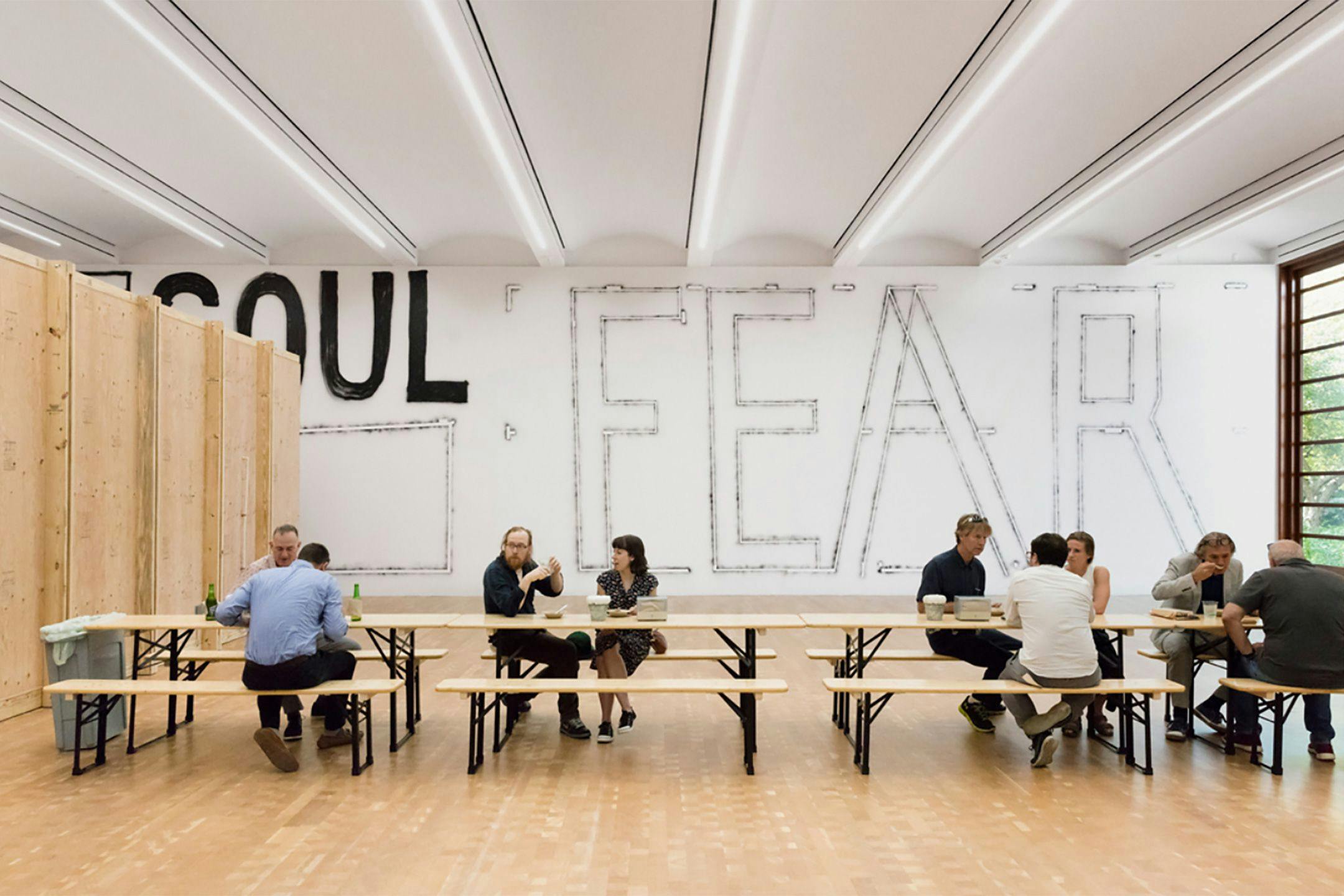 An installation view of viewers interacting within the exhibition Fear eats the soul at Glenstone, dated 2019 to 2020.