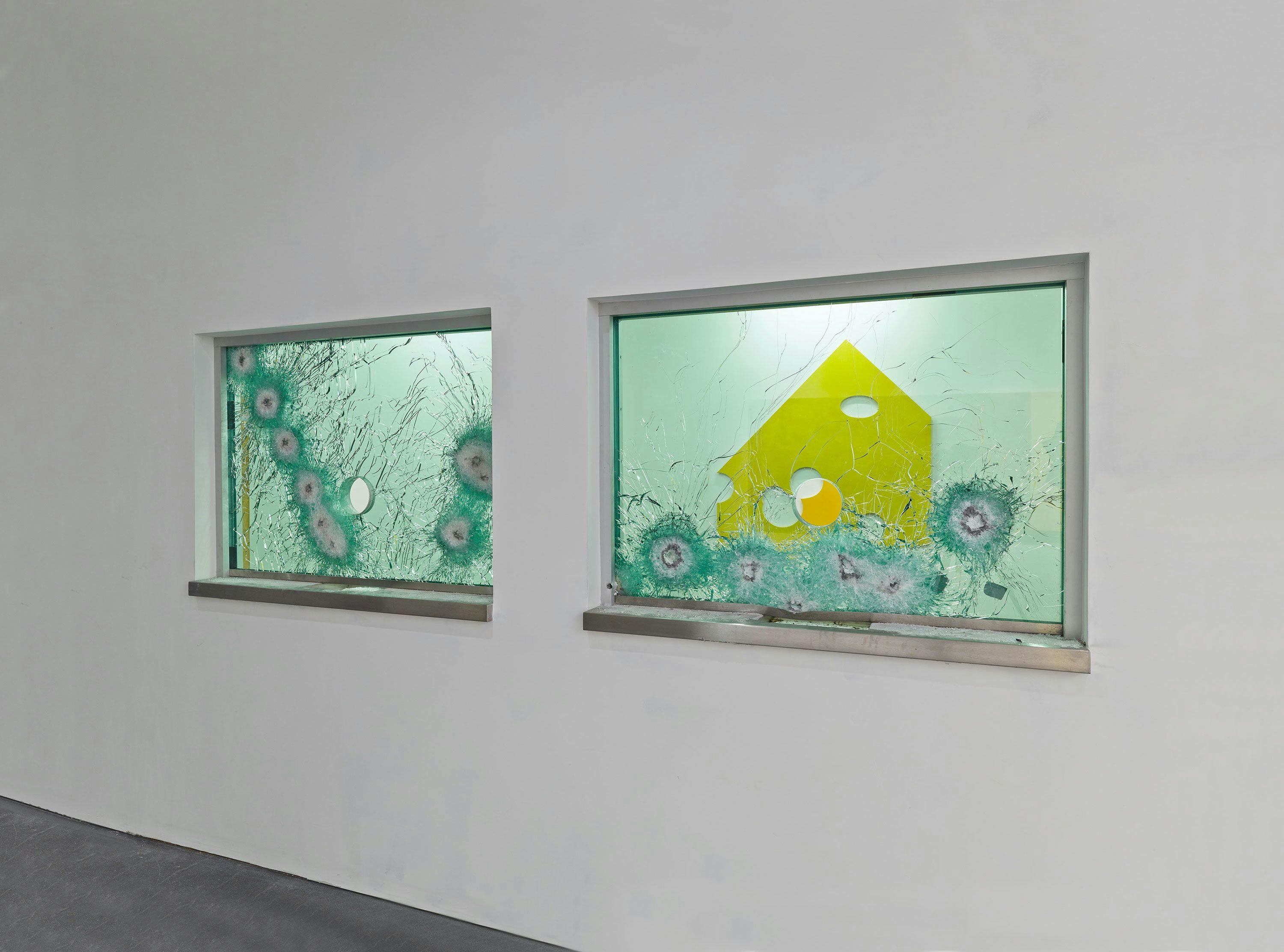 A two part metal, bullet fragments, and glass artwork by Nate Lowman, titled Infinity Window, dated 2012.