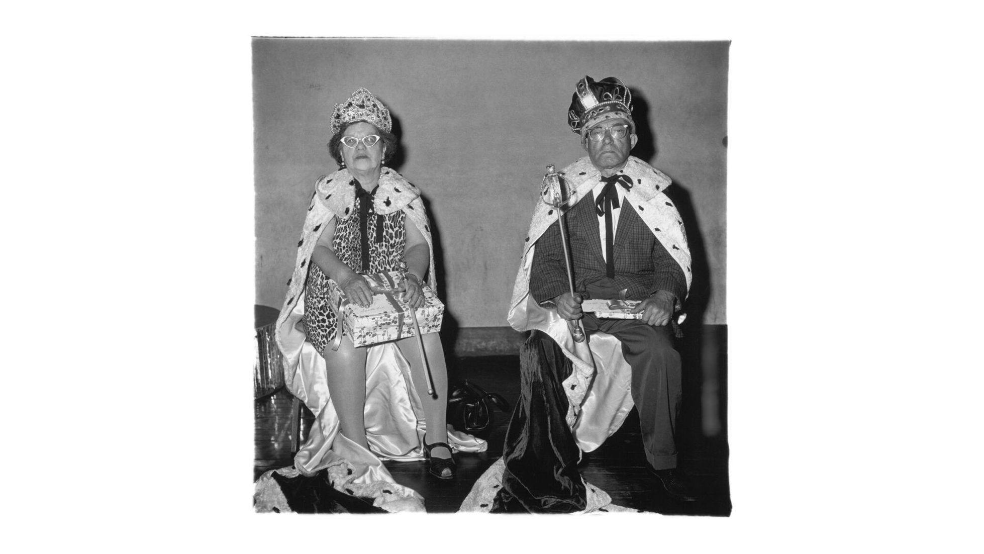 An artwork by Diane arbus titled The King and Queen of a Senior Citizens Dance, N.Y.C. dated 1970