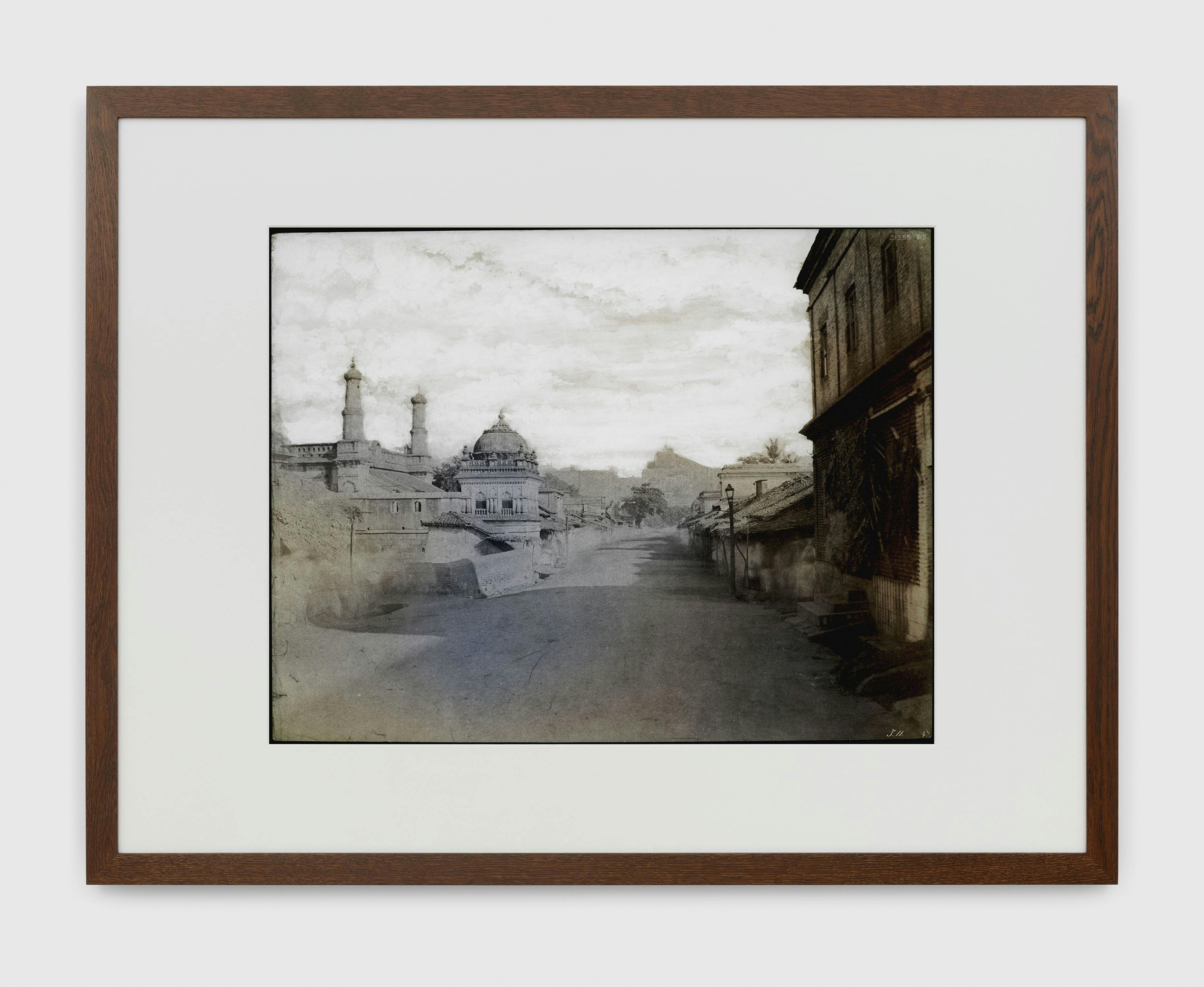 A photograph by Thomas Ruff, titled tripe_17 Trichinopoly. Street view, the rock in the distance., dated 2018.