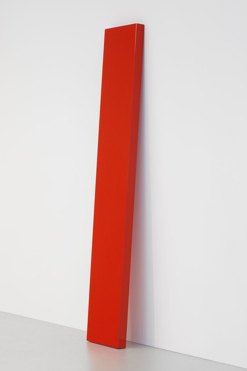 A mixed media sculpture by John McCracken, titled Red Plank, dated 1967.