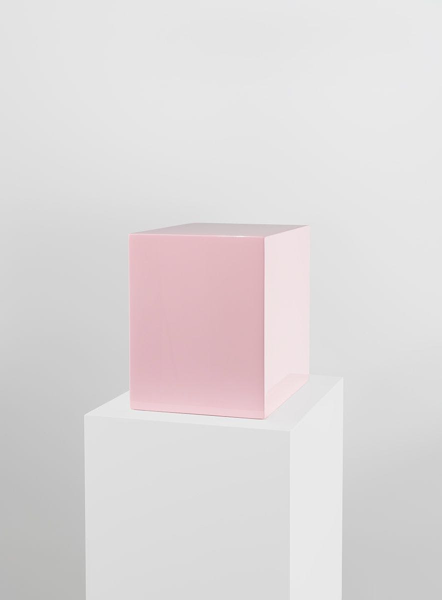 A mixed media sculpture by John McCracken, titled Untitled (Pink Block), dated 1968.