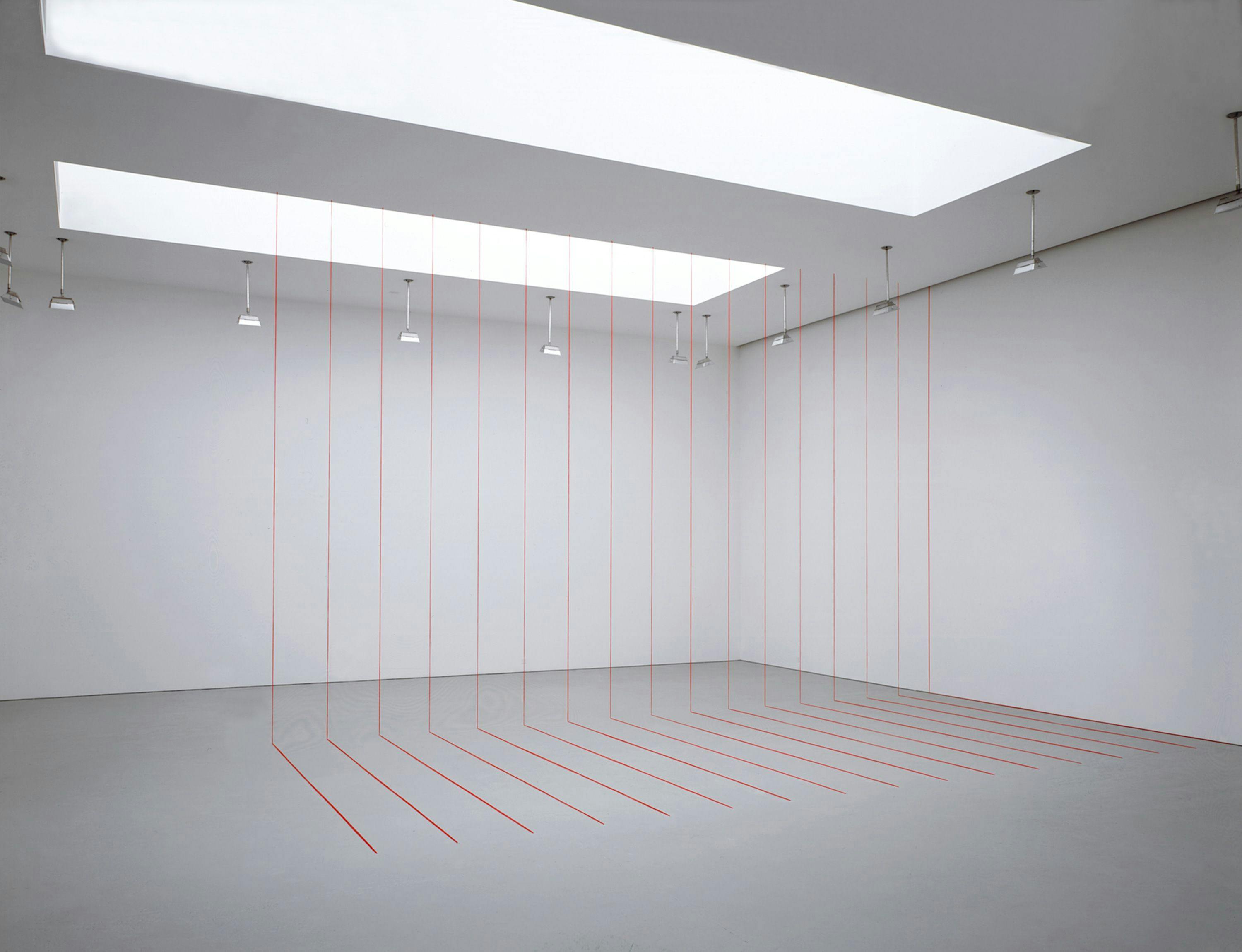 A red acrylic yarn artwork by Fred Sandback, titled Untitled (Sculptural Study, Seventeen-part Right-angled Construction), 1985 and 2005.