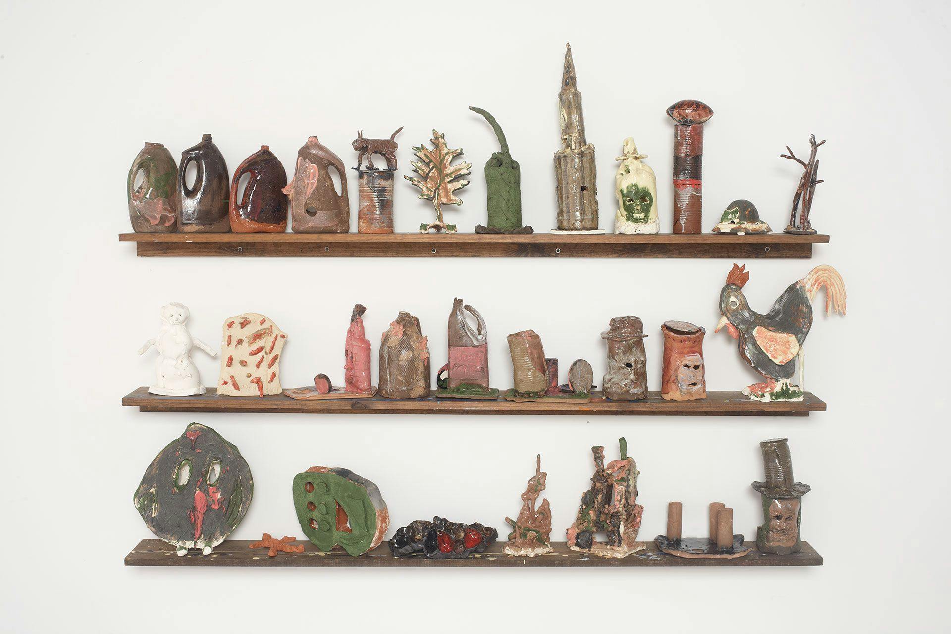 An untitled set of 29 ceramic sculptures by Josh Smith, dated 2013.
