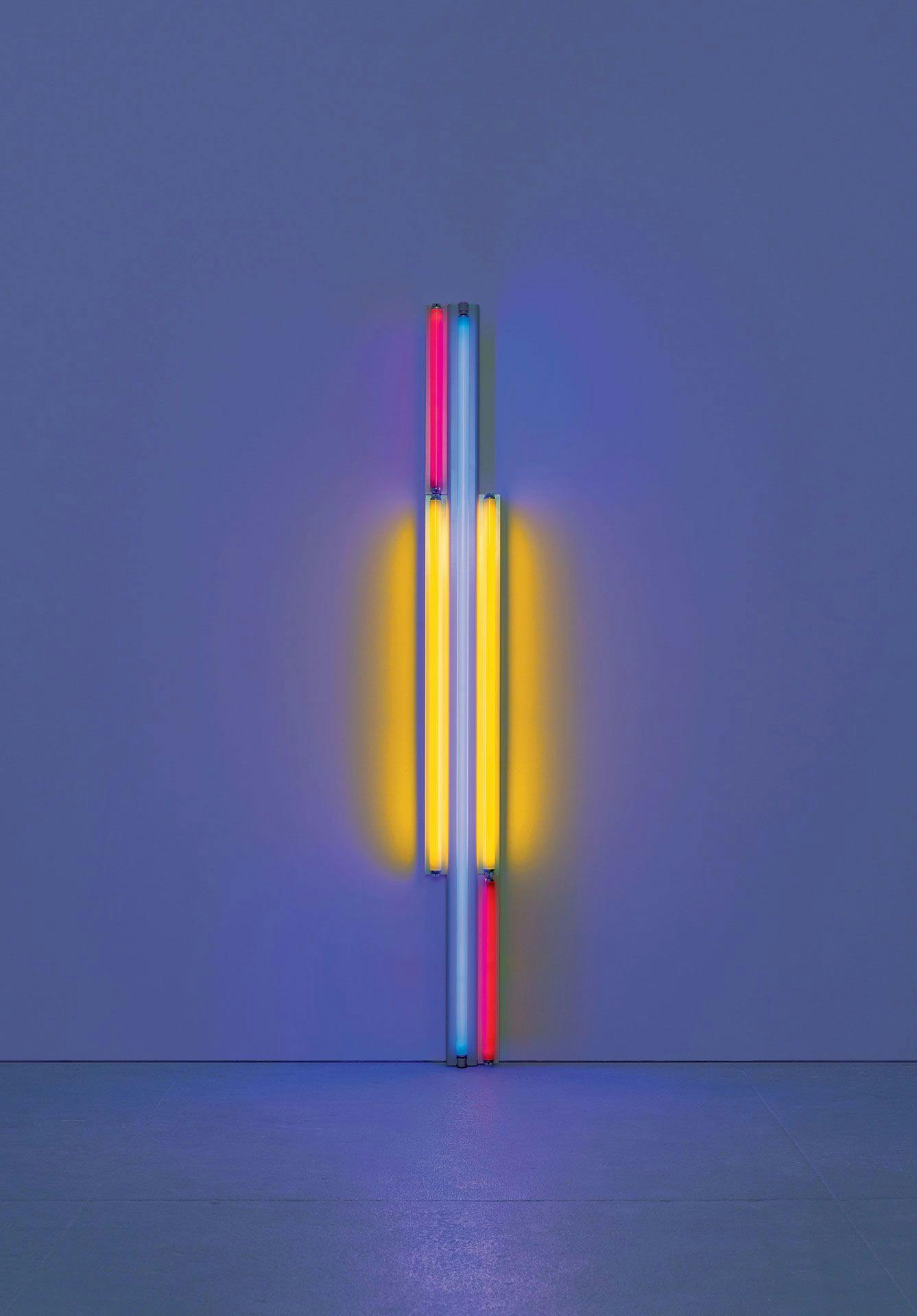 A sculpture in red, yellow, and blue fluorescent light by Dan Flavin, titled untitled (to Piet Mondrian), dated 1985.
