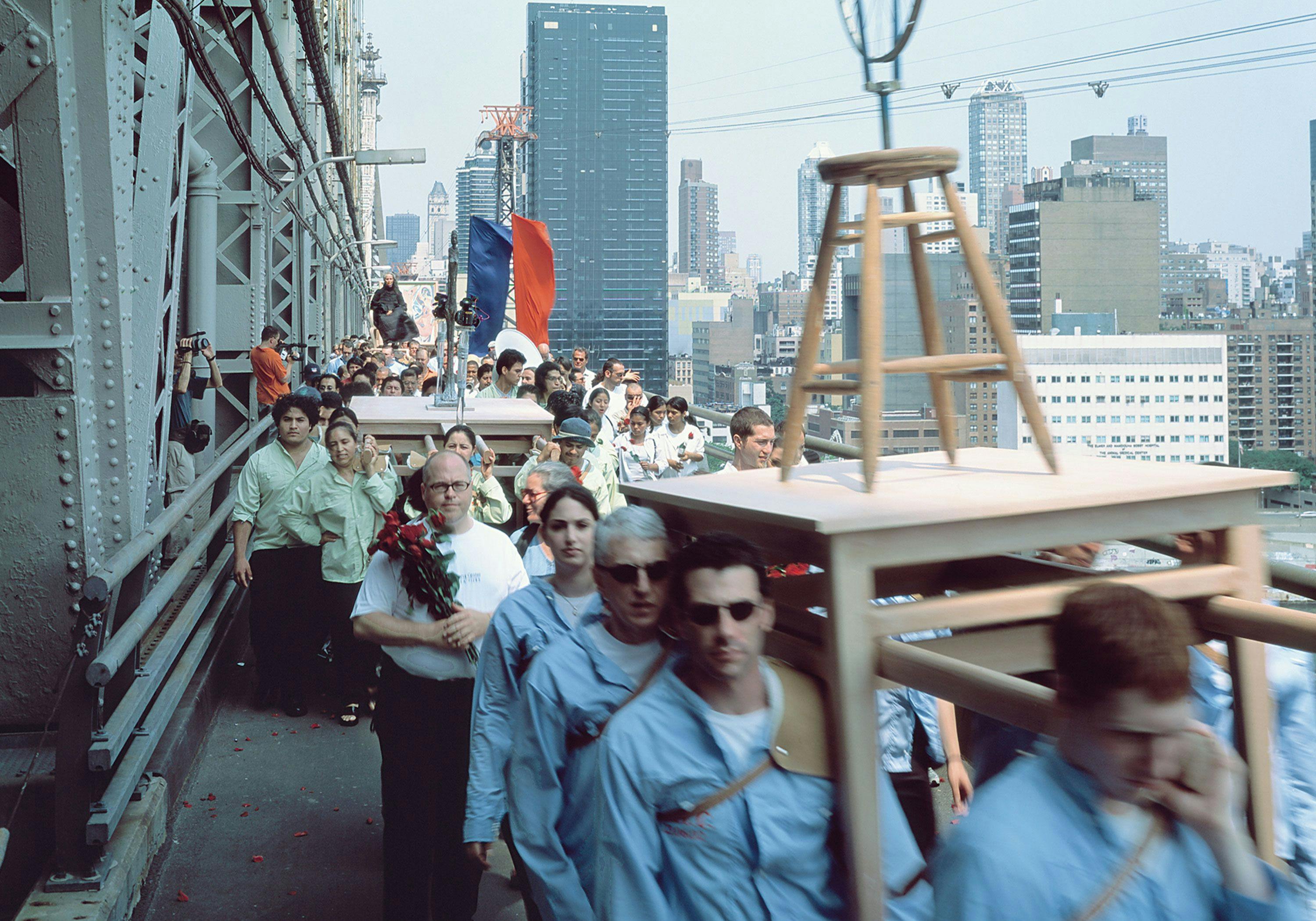 A still from a video by Francis Al√øs, titled The Modern Procession, dated 2002.