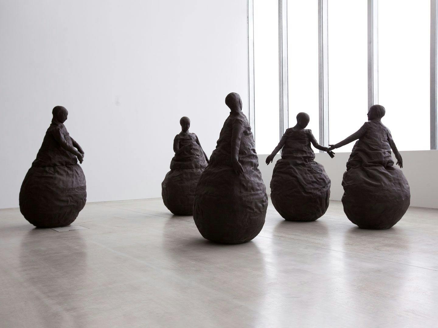 A mixed media sculptural installation by Juan Muñoz, titled Conversation Piece III, dated 2001, at Turner Contemporary, un Margate, United Kingdom, in 2013. 