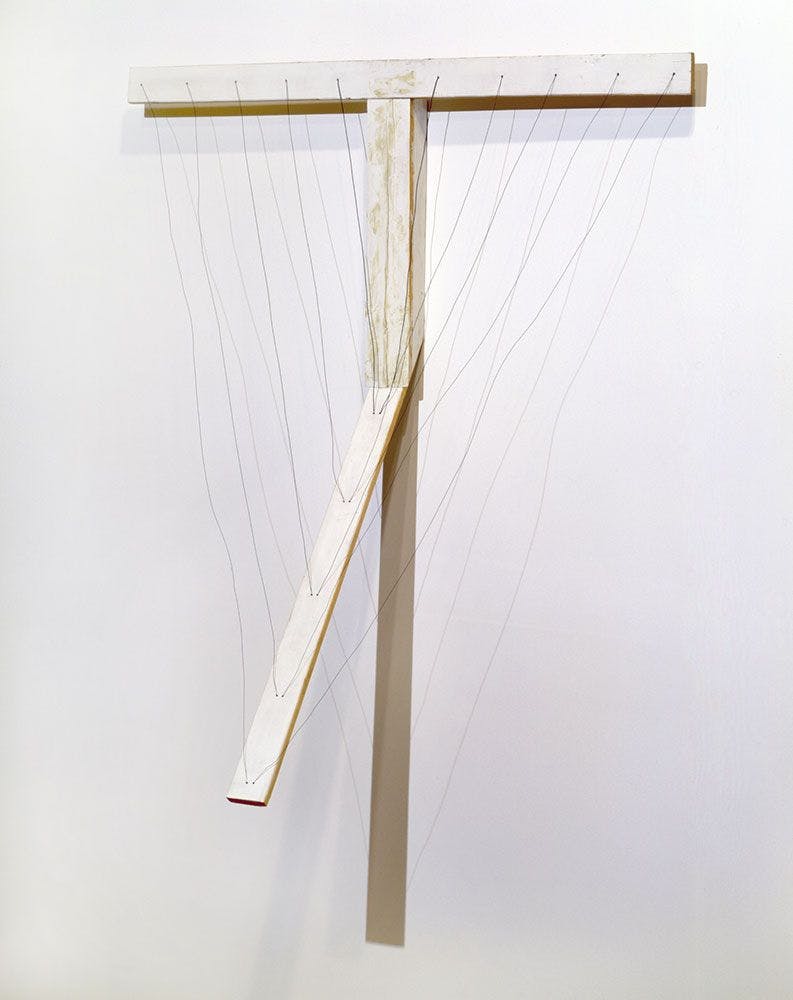 A mixed media, wall-mounted sculpture by Al Taylor, titled Untitled: (Wire Instrument--Hot Tub), dated 1989 to 1990.
