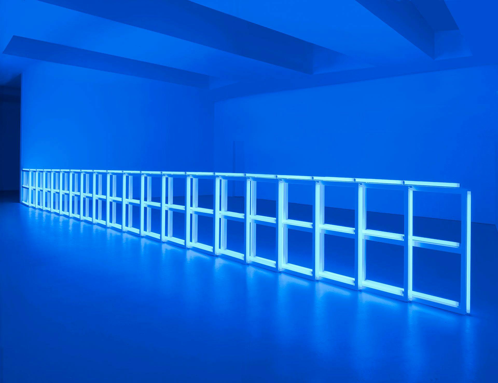 A sculpture in blue fluorescent light by Dan Flavin, titled untitled (to Helga and Carlo, with respect and affection), dated 1974.