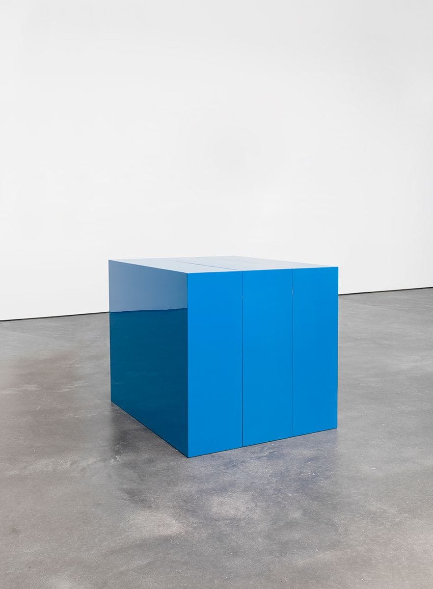 A mixed media sculpture in three parts by John McCracken, titled Blue Block in Three Parts, dated 1966.