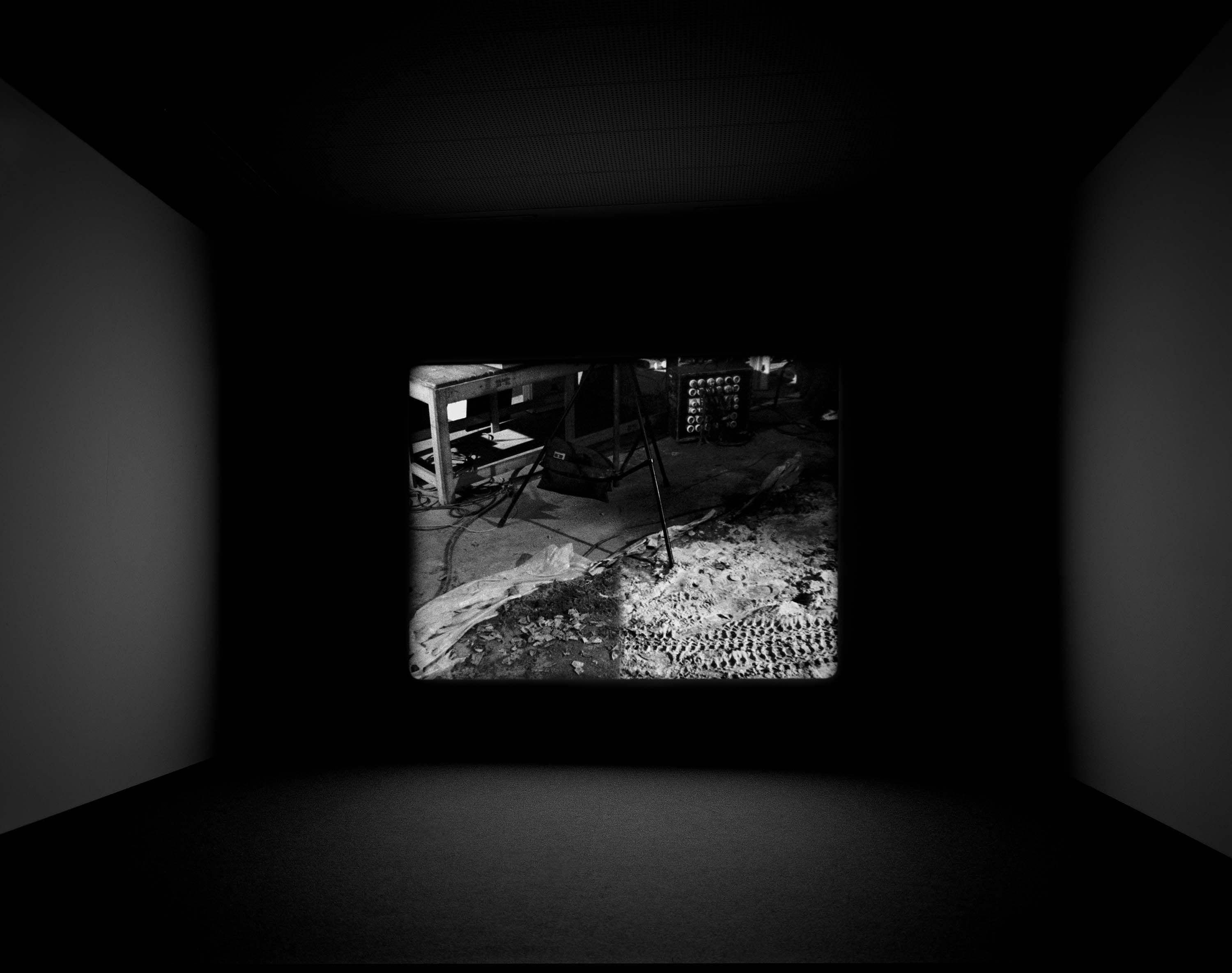 A film installation by Stan Douglas, titled Der Sandmann, dated 1995.