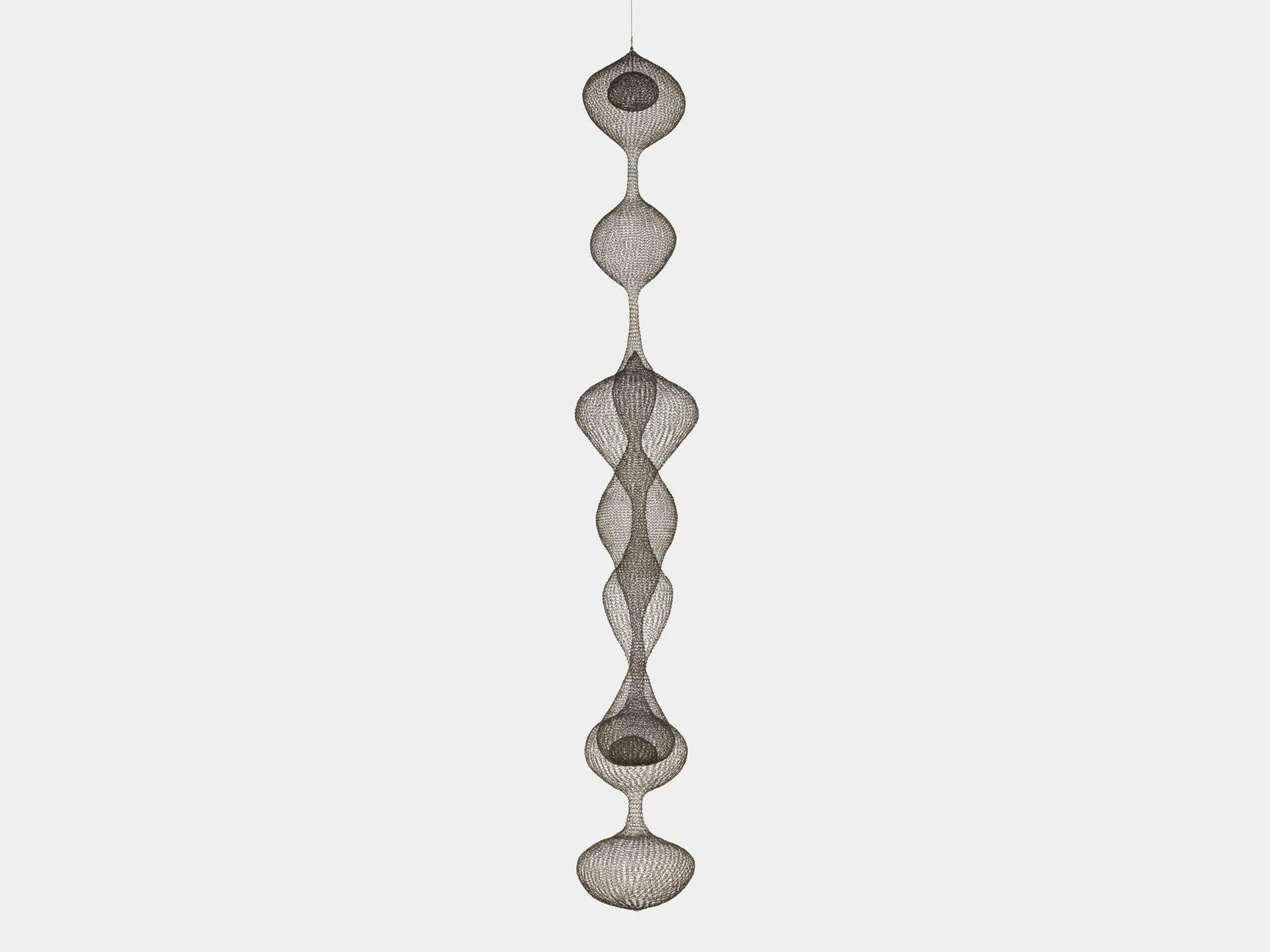 A sculpture by Ruth Asawa, titled Untitled (S.272, Hanging Seven-Lobed, Continuous Interwoven Form, with Spheres within Two Lobes), dated  circa 1954.