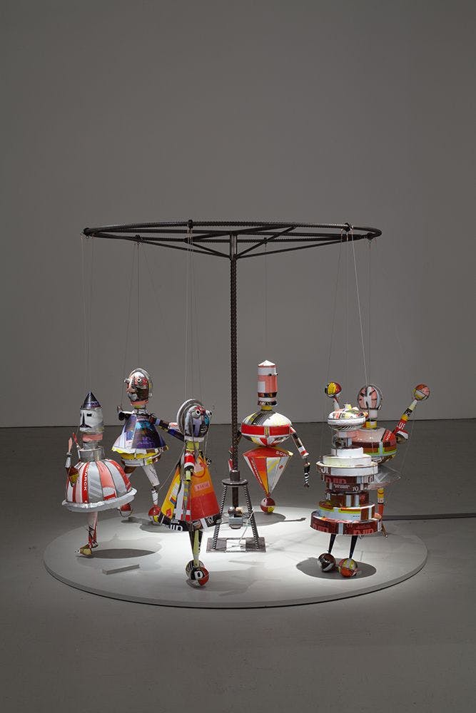 A sculpture by Marcel Dzama titled Turning into puppets [Volviendose marionetas], dated 2011.