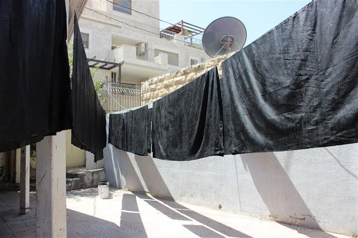An installation by Oscar Murillo, titled Jerusalem Lives at Jerusalem in Israel, dated 2017.