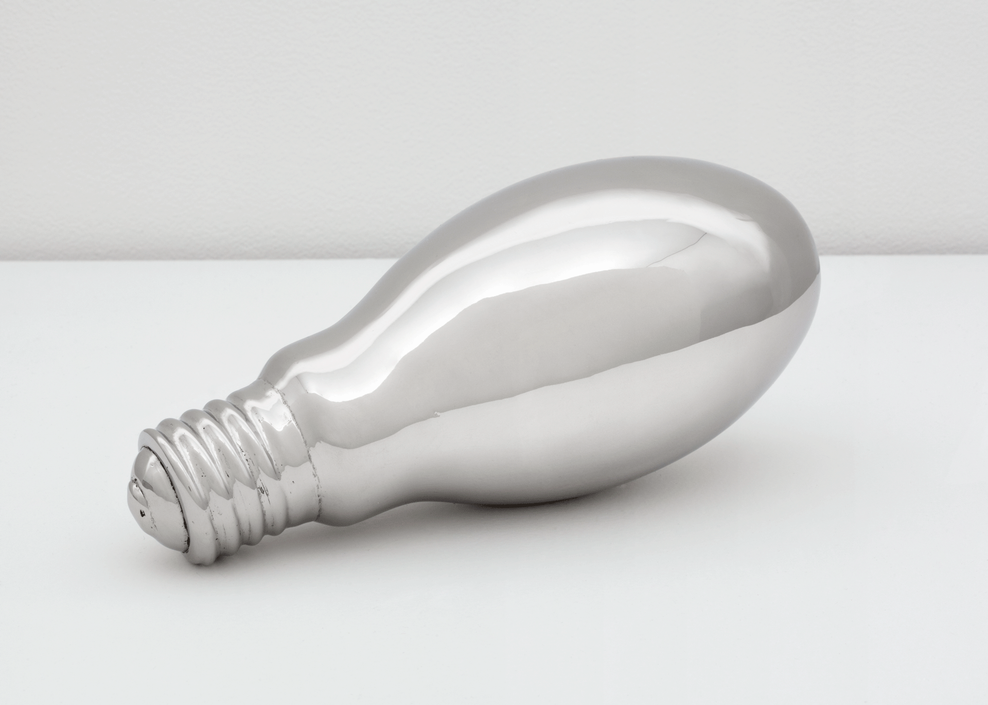A sculpture by Sherrie Levine, titled, Light Bulb, dated 2000.